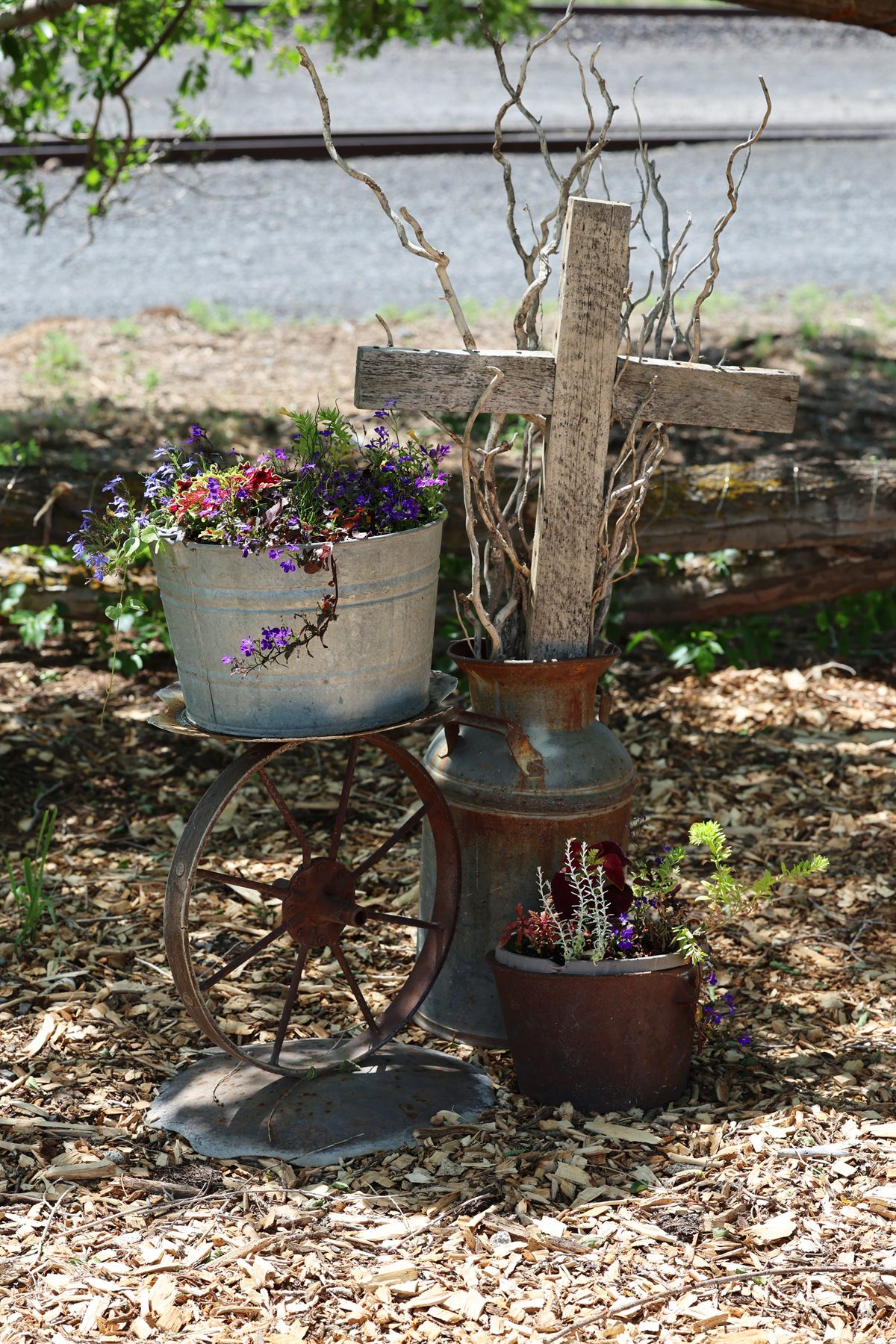 Floral decor with railroad tracks in the background.